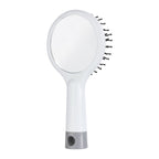 Cepillo para cabello anti-frizz con masajeador y espejo integrado, personalizado para marcas de belleza.