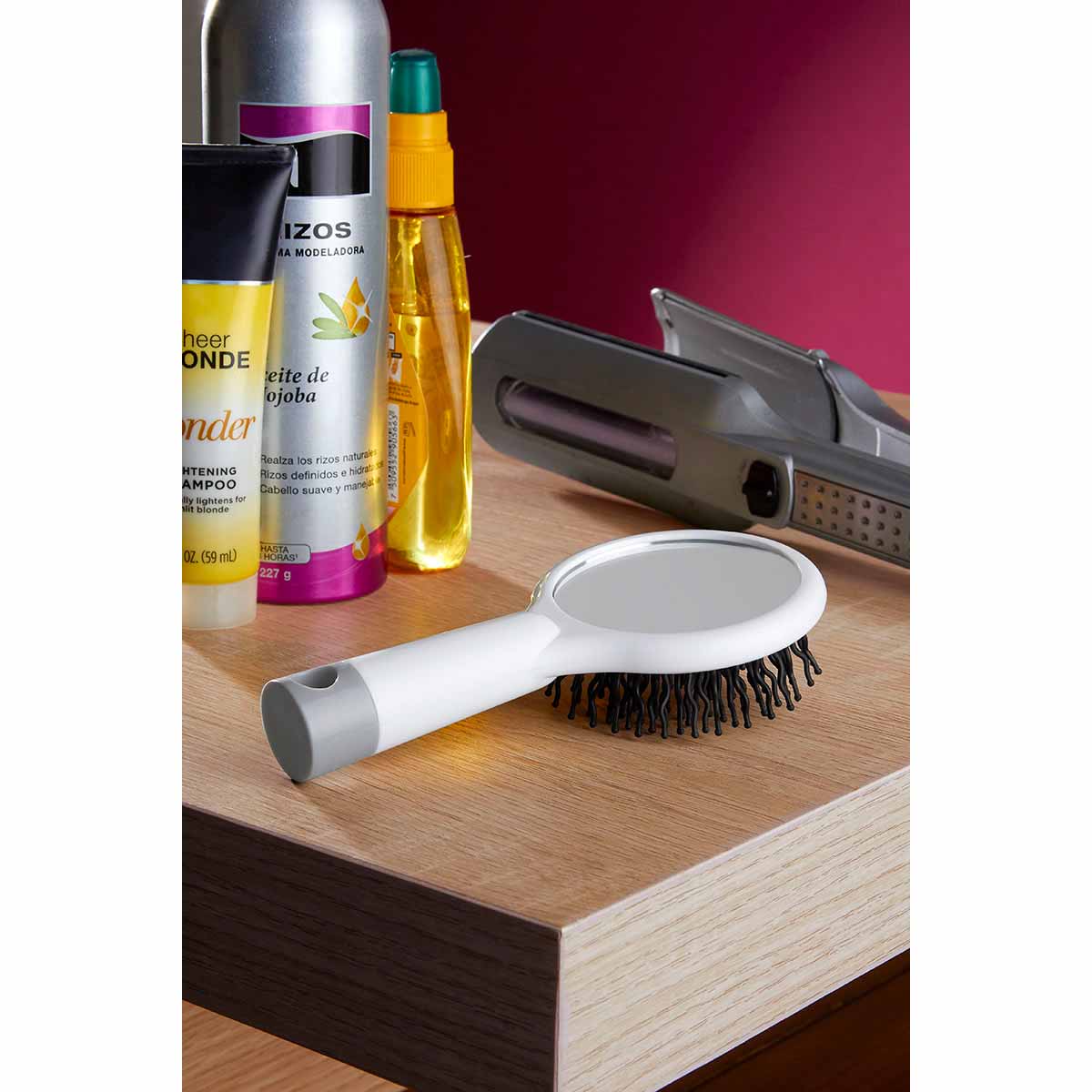 Cepillo para cabello anti-frizz con masajeador y espejo integrado, personalizado para marcas de belleza.