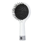 Cepillo para cabello anti-frizz con masajeador y espejo integrado, personalizado para marcas de belleza.