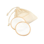 Set de cinco almohadillas desmaquillantes reutilizables de fibra de bambú con bolsa de algodón personalizada.