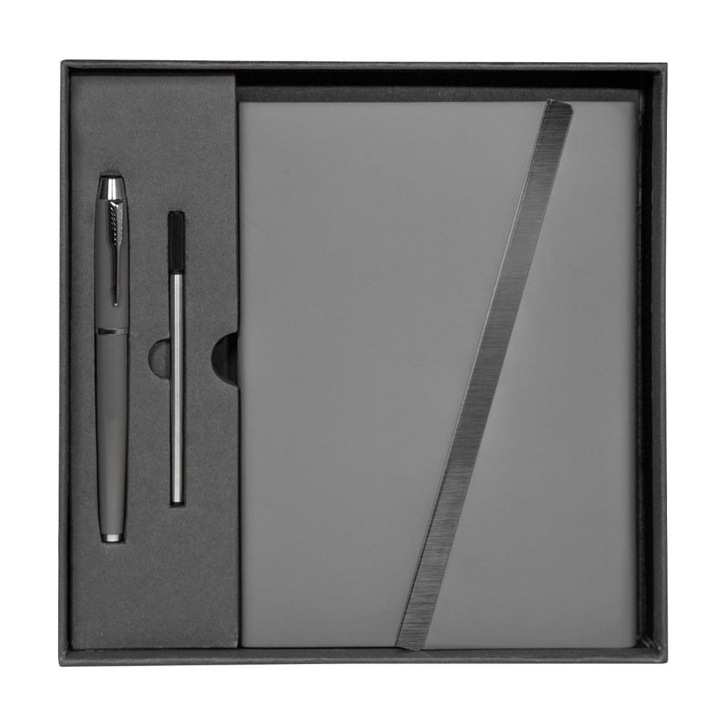 Set ejecutivo de libreta de curpiel con solapa magnética y bolígrafo de acero inoxidable personalizado para empresas.
