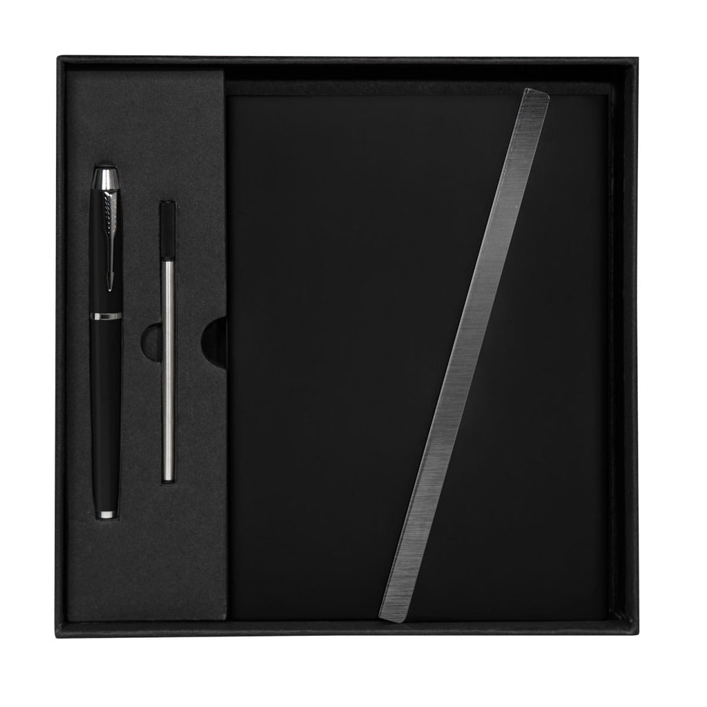 Set ejecutivo de libreta de curpiel con solapa magnética y bolígrafo de acero inoxidable personalizado para empresas.