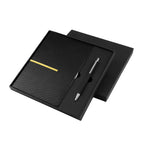 Kit ejecutivo personalizado con libreta de curpiel, bolígrafo metálico y caja de regalo para empresas.