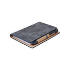 Libreta de curpiel personalizada con bolígrafo ecológico y notas adheribles de colores para empresas.