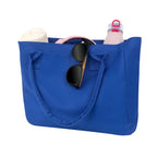 Bolsa promocional personalizada de poliéster con fuelle, asas reforzadas y bolsillo interno para eventos corporativos.